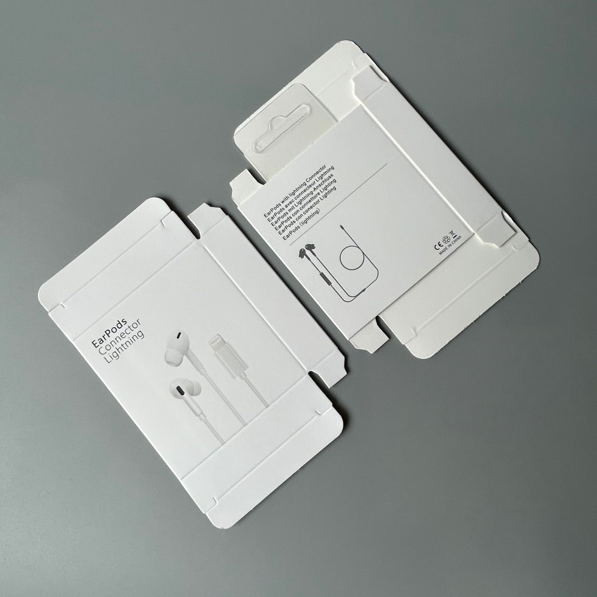Caja de embalaje de auriculares Caja de auriculares con cable en la oreja Caja exterior de auriculares de Apple Caja de papel de auriculares para teléfono móvil al por mayor image 17