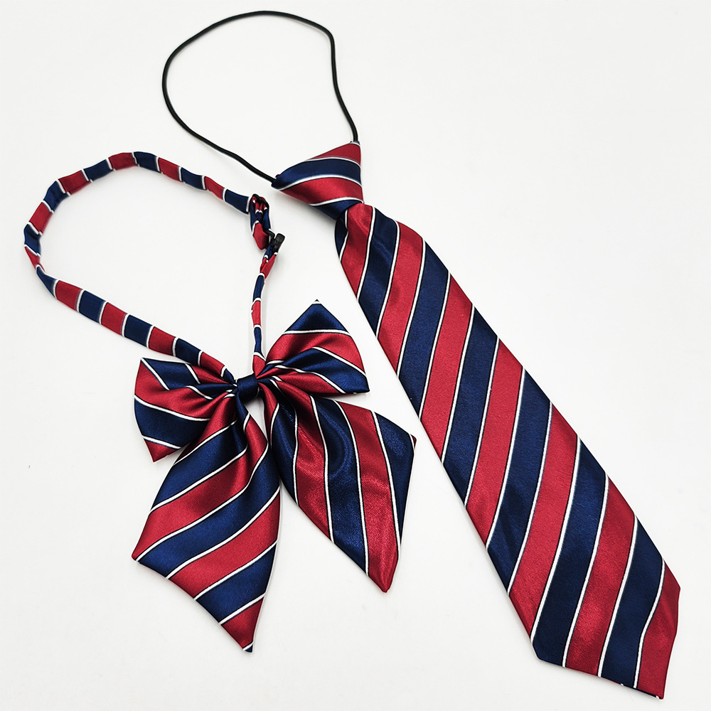 Spot de fábrica al por mayor conjunto de pajarita de corbata para niños de escuela primaria, corbata a rayas de color sólido, pajarita de raíz de plumas