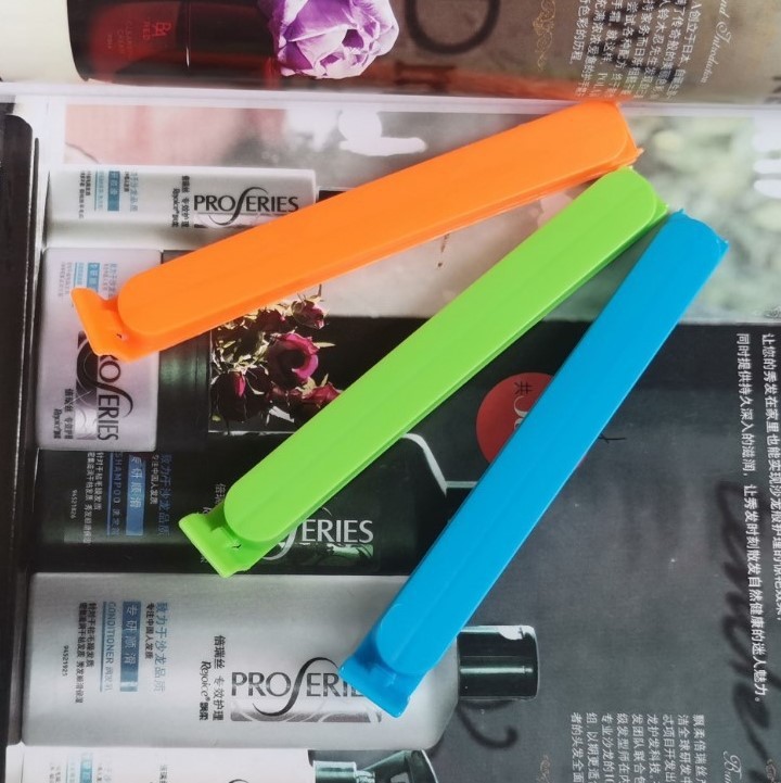 Clips de sellado de alimentos del fabricante, clips a prueba de humedad y para mantener la frescura para té, leche en polvo, refrigerios, bolsas de alimentos, clips de sellado de plástico con logotipo personalizado.