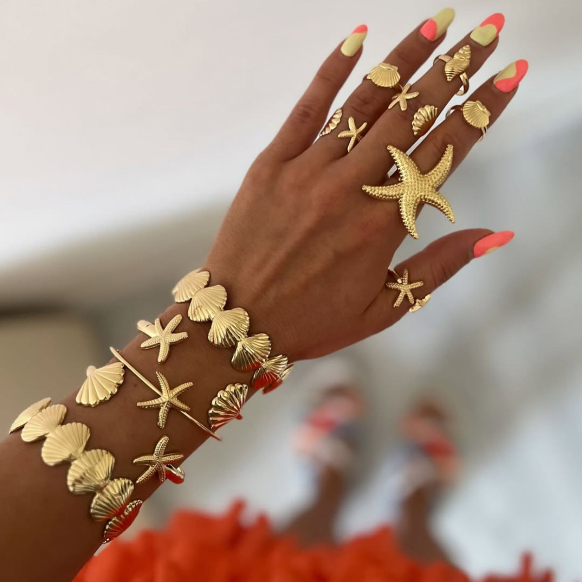 Tena anillo de acero inoxidable europeo y americano diseño de nicho femenino todo fósforo titanio marino estrella de mar de acero conjunto de pulsera de joyería de concha