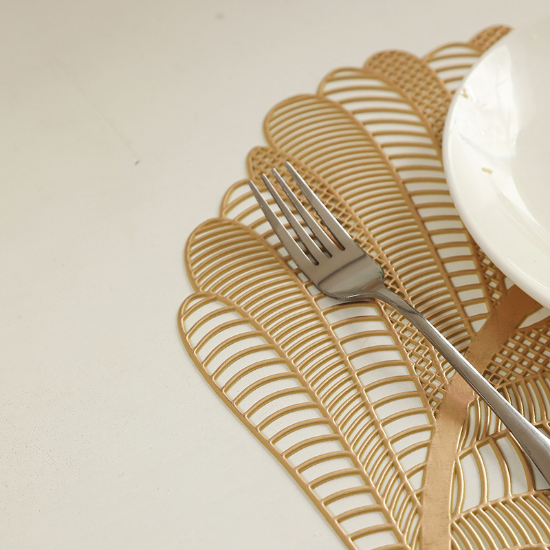 Suministro directo de fábrica hueco mantel dorado occidental aislamiento de alimentos estera hoja tipo europeo simple mantel tazón de montaña al por mayor