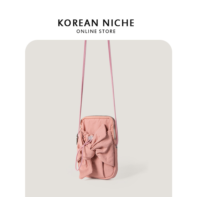 Bolso bandolera pequeño cuadrado de un solo hombro con lazo y diseño de nicho coreano nuevo 2024 para mujer con boca con cordón_voghion.com