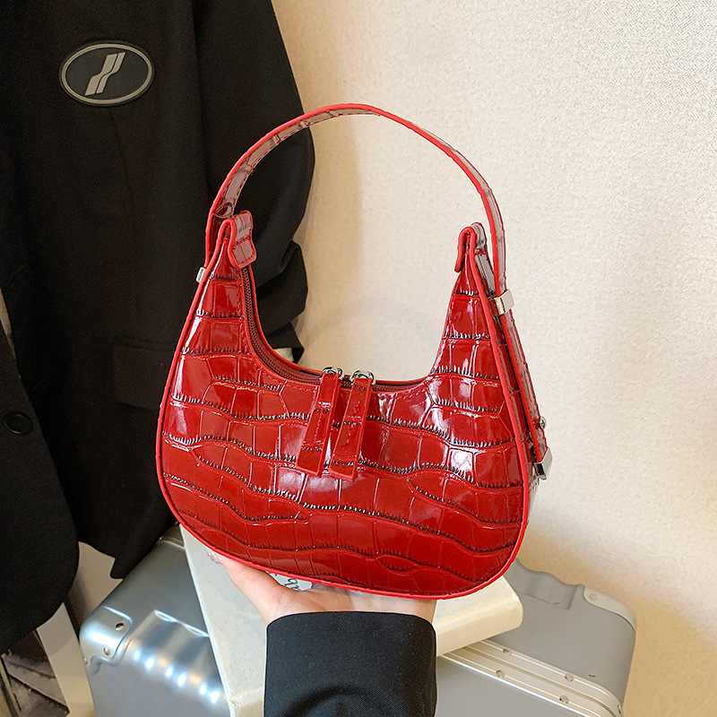 Bolso de axila con textura transfronteriza 2025 primavera nuevo bolso femenino bolso retro con patrón de piedra bolso de hombro brillante de charol