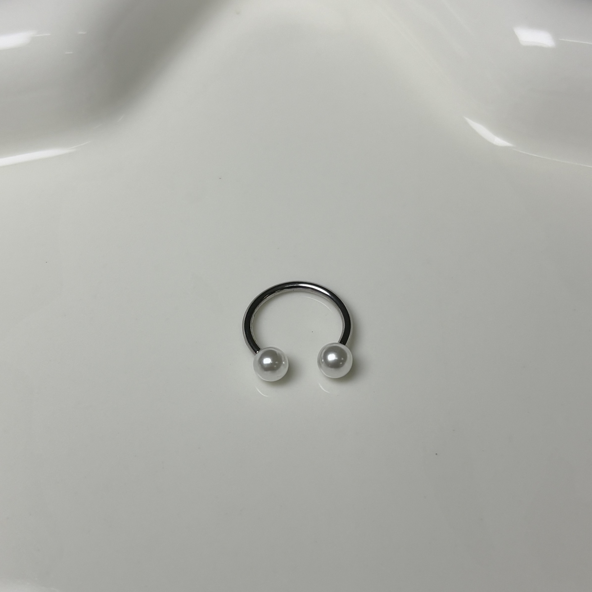 Labret piercing jewelry detail image