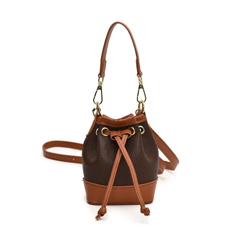 Bolsos de hombro coreanos para niños y niñas de moda estampado de leopardo de color extranjero bolsas de balde de agua para bebés 2025 nuevas bolsas mini para niños