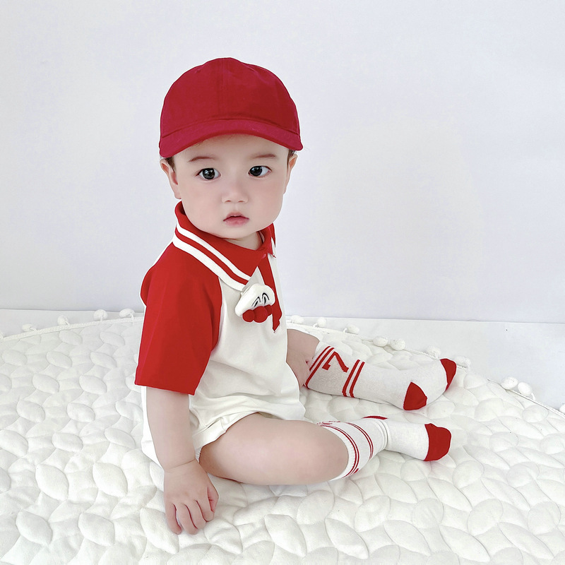 Bebé verano nuevo mono estilo coreano niños y niñas casual deportes estilo solapa rojo y blanco costura dibujos animados vaina