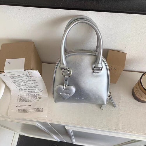 Rourou Chen Whiterm Korean version niche design women's bag new cute portable shell bag single shoulder crossbody bag