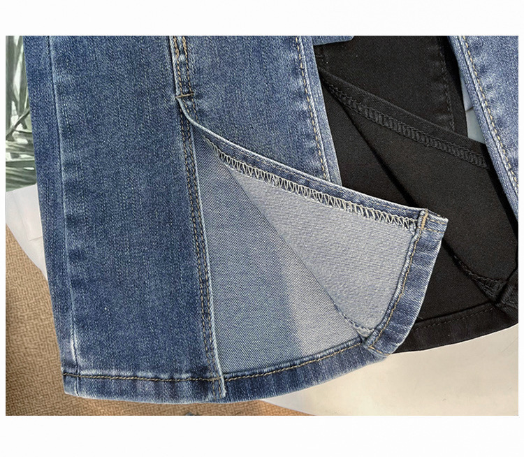 Dames high-waist flared jeans stretch bootcut broek met split_voghion.com