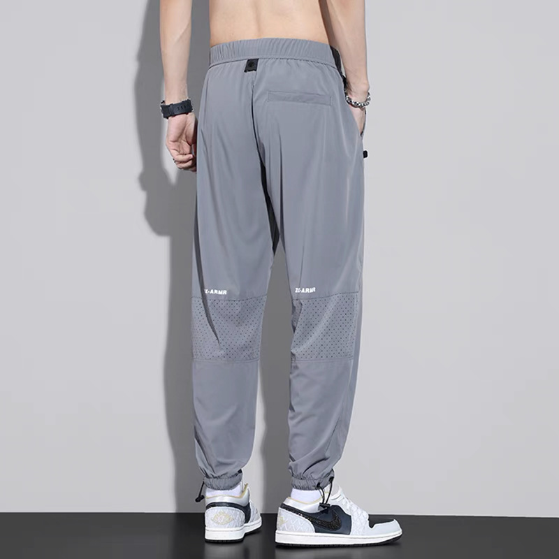 Pantalones casuales de seda de hielo, estilo fino de verano transpirable, secado rápido, marca de marea suelta, deportes harem, pantalones de ropa de primavera y otoño de nueve puntos para hombres