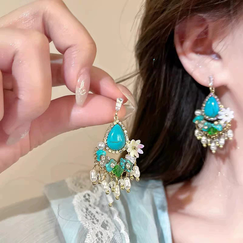 2026 viento falso sensación de atmósfera super inmortal pendientes de flores de malla temperamento suave de chiffon para mujeres pendientes