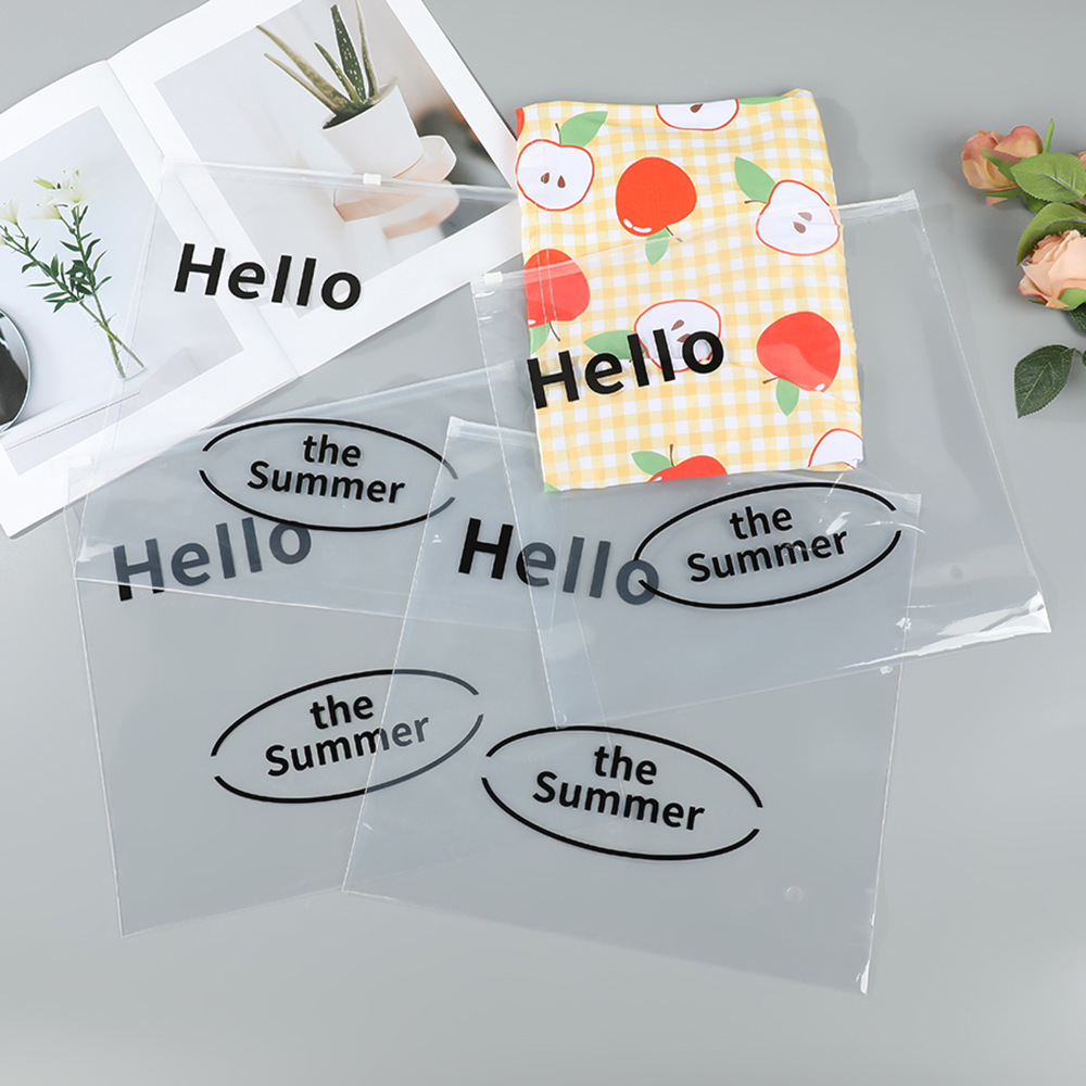 Bolsa con cremallera de ropa Bolsa con cremallera de crisantemo pequeño Bolsa de embalaje de camiseta Bolsa de ropa interior Bolsa de ropa PE esmerilada pequeña bolsa ziplock