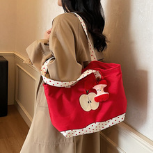 可爱卡通苹果单肩包女2025新款小众设计休闲托特包通勤波点补课包