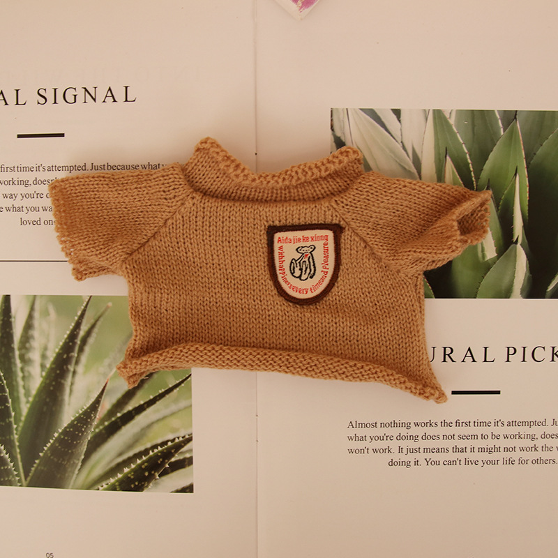 Suéter de muñeca de peluche oso de peluche con dientes perdidos ropa de muñeca máquina de agarre para mascotas accesorios de muñeca suéter camiseta al por mayor