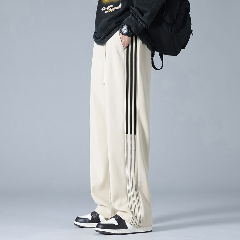 Pantalones deportivos a rayas estadounidenses para hombres y mujeres 2024 pantalones casuales rectos de cintura alta cuerdas sueltas pantalones al por mayor