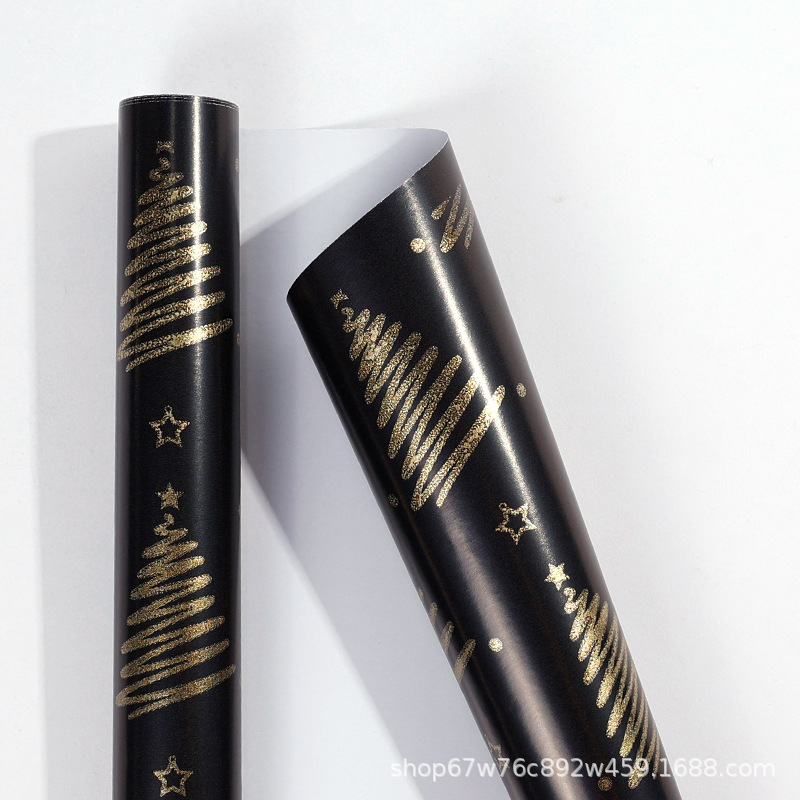 Rollo de papel de regalo de Navidad transfronterizo paquete de tubo de papel de regalo de árbol de Navidad de copo de nieve de oro negro rollo de gran tamaño sentido avanzado