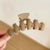 2# Irregular coffee-colored gripper, 11cm long and 4cm wide