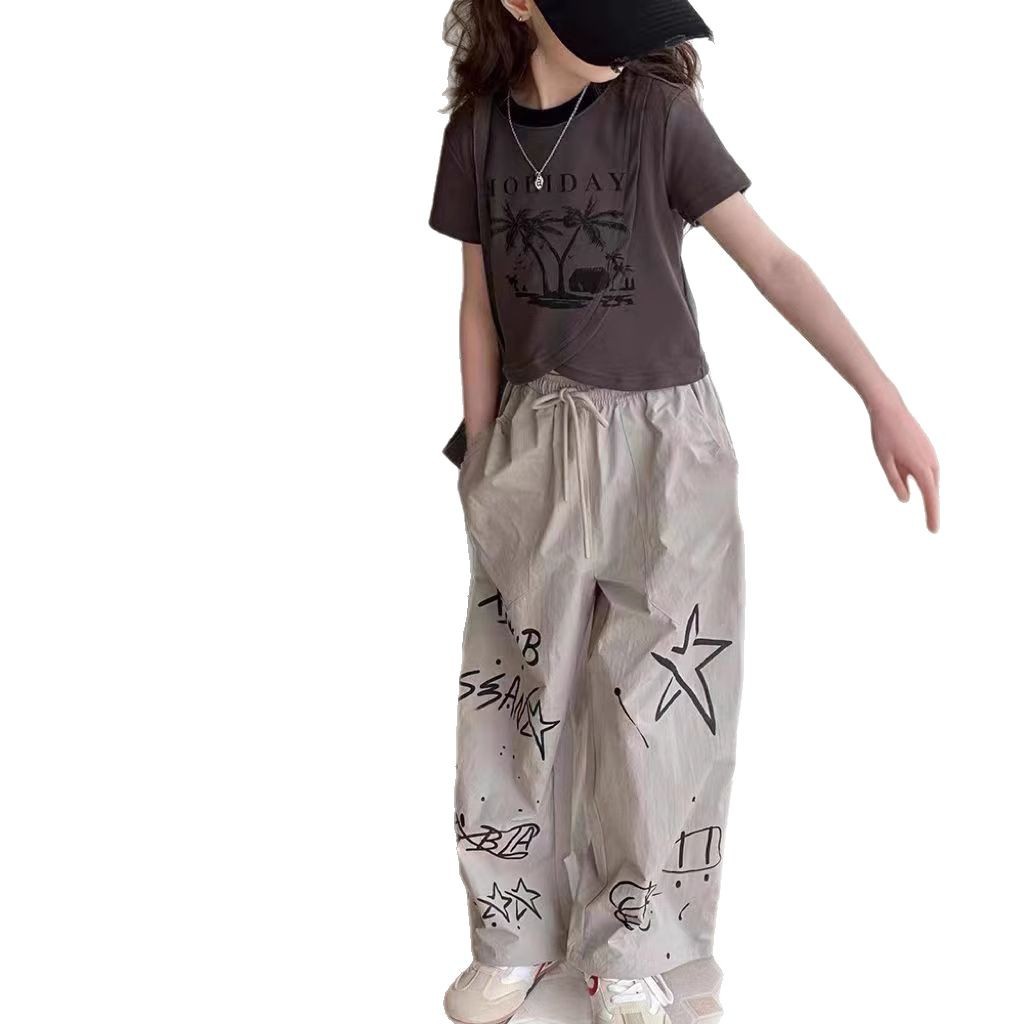 Traje de verano para niñas 2025 nuevo estilo ropa de verano occidental de moda para niños grandes camiseta de manga corta pantalones casuales de dos piezas