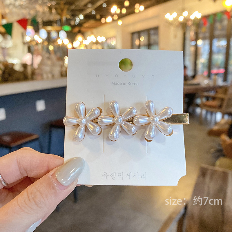 Pasador de pelo de perlas de alta gama estilo francés para mujer, clip para flequillo lateral, elegante clip para el pelo de la frente, accesorio para el pelo tipo pico de pato.