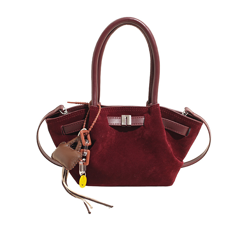 Cestas de platos de mano bolsas de cubo mujeres 2025 nuevo cross-border europeo y americano retro mochila de piel de ciervo esmaltado