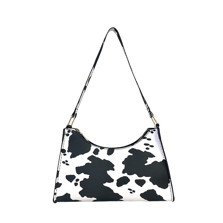 2024 nuevo bolso de axila con estampado de leopardo de moda popular de todos los partidos Bolso de hombro portátil para mujer casual retro europeo y americano