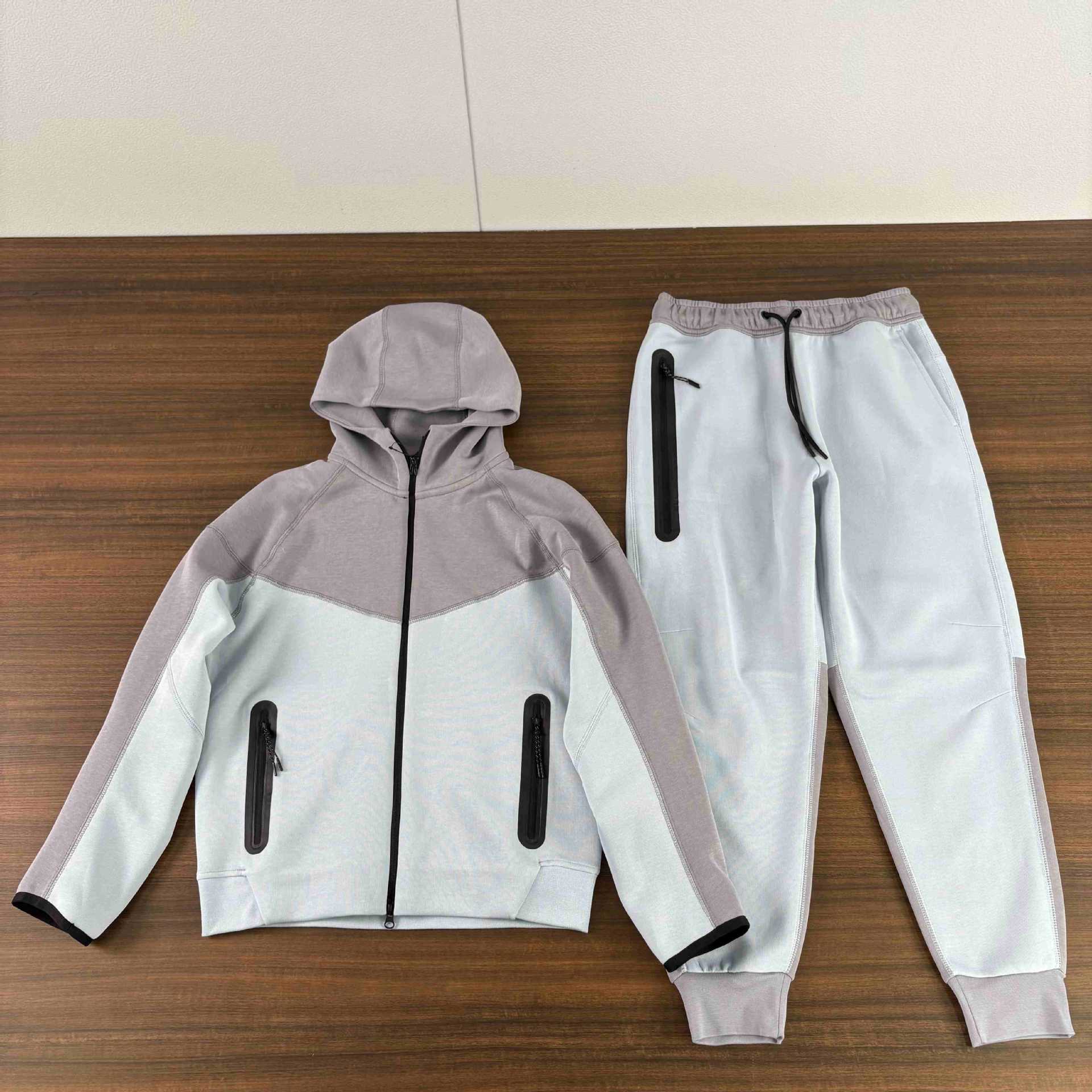 Traje deportivo de algodón de aire traje deportivo de hombre manga larga chaqueta con capuzas de color con cremallera prensada pantalones de seguridad