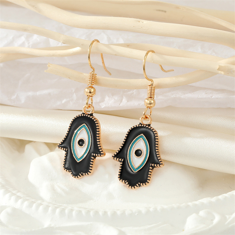 Retro Alloy Black Devil Eyes Palm Earrings Necklace Set