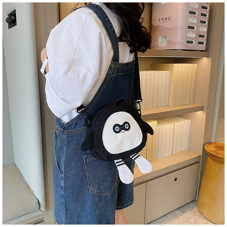 The new 2024 children's egg-shaped party backpack is a cute cartoon canvas single-shoulder bag and a fashionable and stylish small backpack undefined