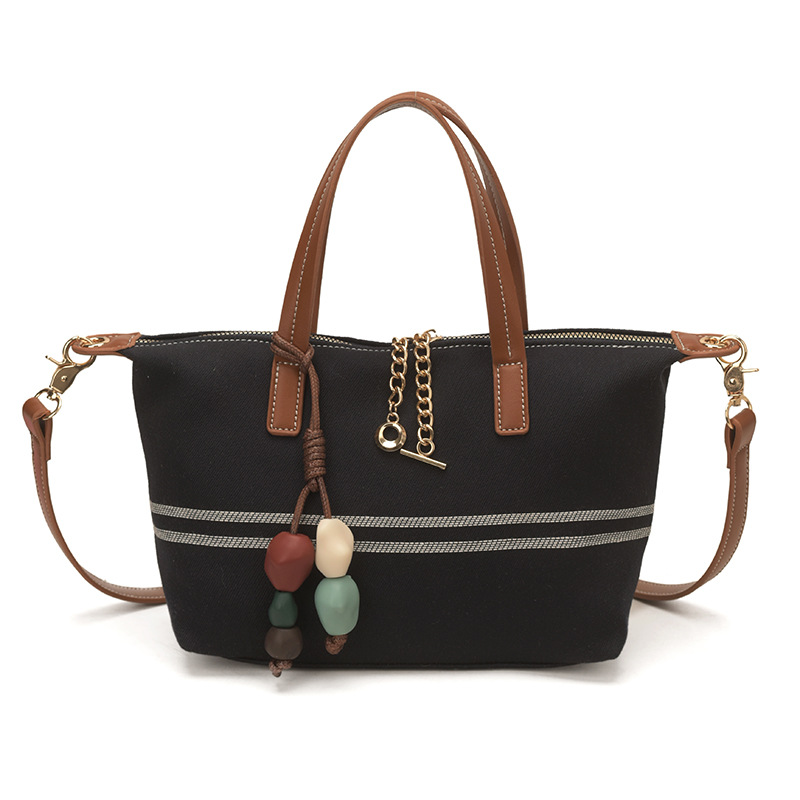 Tela estriada bolso de bolsillo de mano mujer 2026 venta caliente nuevo estilo de alta calidad sensación de moda versátil bolso de hombro