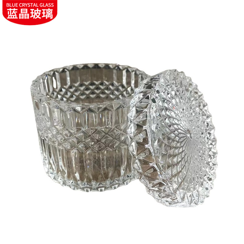 En stock suministro de embalaje independiente de vidrio transparente candelabro tarro de caramelo en relieve patrón cubierta de vidrio taza de vela