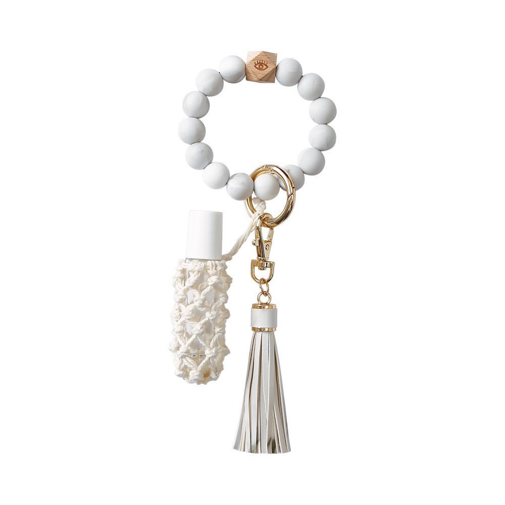 Amazon europeo y americano popular silicona muñeca llavero hecho a mano con cuentas de cuero borla pulsera al por mayor