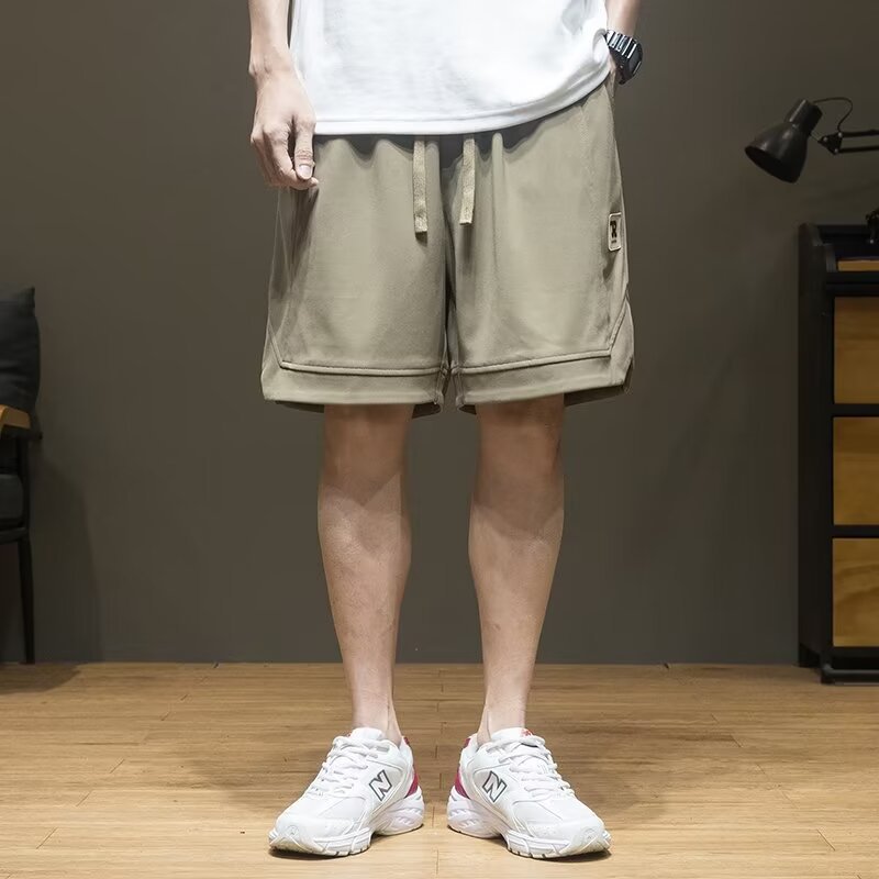 Pantalones cortos deportivos de ropa exterior de verano de la marca de moda estadounidense para hombres sueltos de gran tamaño casual pantalones de cinco puntos rectos transpirables y versátiles