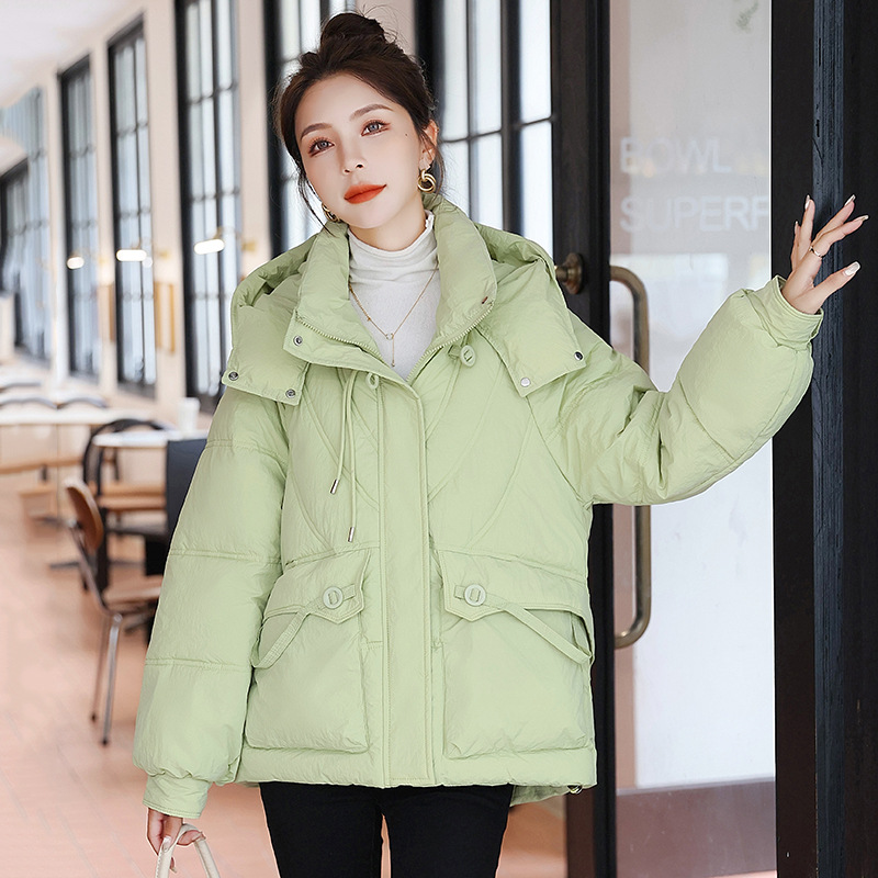 Ropa de algodón pequeño invierno 2025 nueva ropa de invierno coreana chaqueta de algodón gruesa chaqueta de algodón suelta corta con capuchón