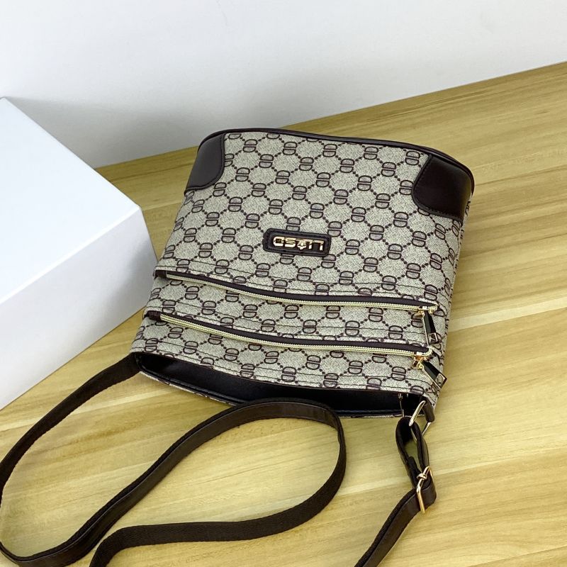 Guangzhou Hengli equipaje para mujer 2025 nuevo estilo coreano bolso de mensajero de un solo hombro bolso de cubo madre de mediana edad bolso de varias capas mujer