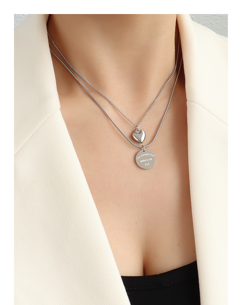 Collier double couche cœur disque en acier titane doré_voghion.com
