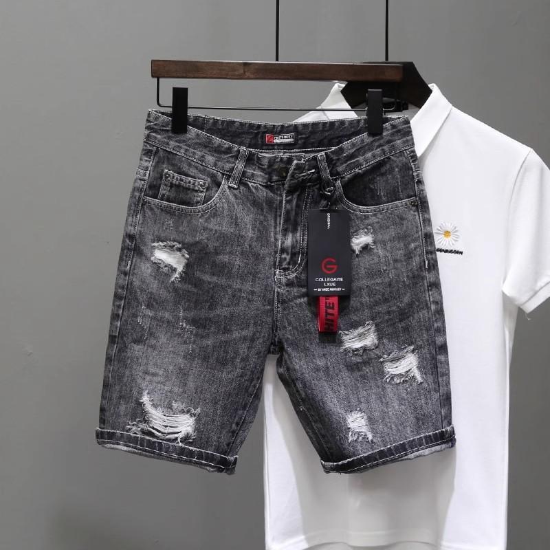 Trendy ripped denim shorts, stylish and cool, perfect for summer, loose-fitting, straight-leg, mid-length, versatile, and easy to match with any outfit