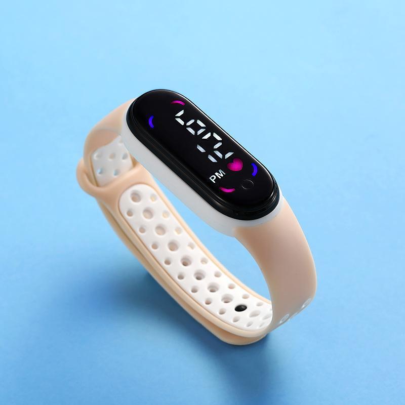 Comercio exterior Venta caliente 50 m natación M7 doble color con LED reloj electrónico niños estudiante deportes impermeable mano táctil