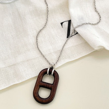 猪鼻子乌木项链链条吊坠长款毛衣链2024秋季新款气质百搭配饰女款