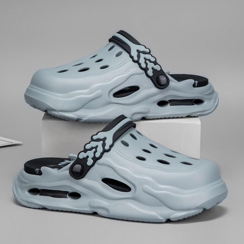 Nuevos zapatos con agujeros para hombres, suela gruesa antideslizante, zapatillas Baotou, sandalias de playa de moda de verano para hombres