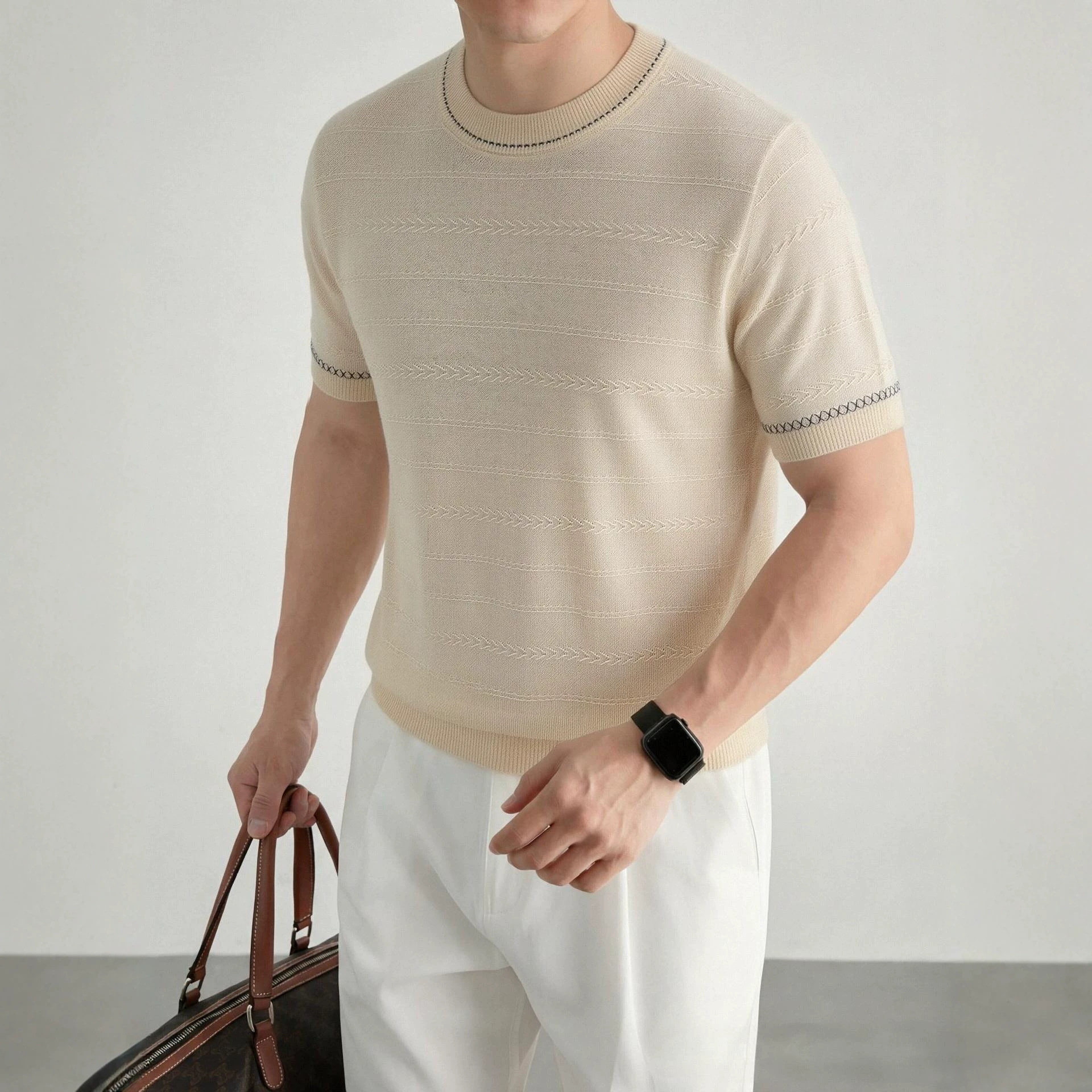 Silk summer knitted T-shirt with a round collar