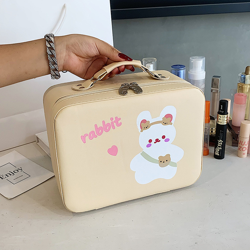 Venta directa de fábrica lindo de dibujos animados de alta apariencia caso cosmético de gran capacidad de almacenamiento de herramientas cosméticas caja portátil al por mayor