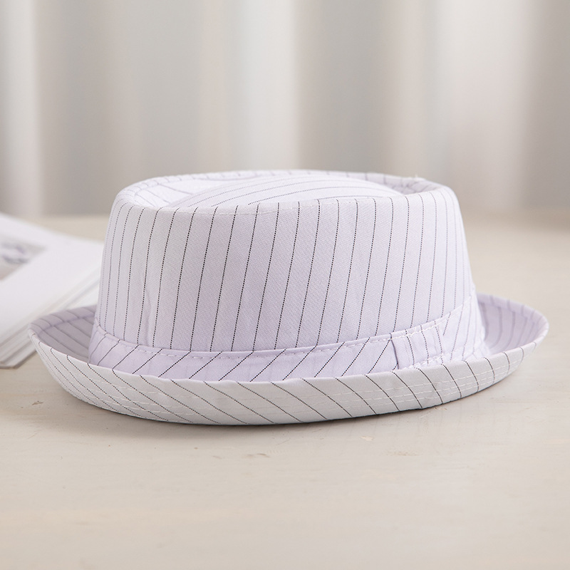 Sombrero de los hombres de primavera y verano británico europeo y americano de moda sombrero de copa a cuadros en blanco y negro a prueba de sol transpirable Jazz sombrero fábrica al por mayor