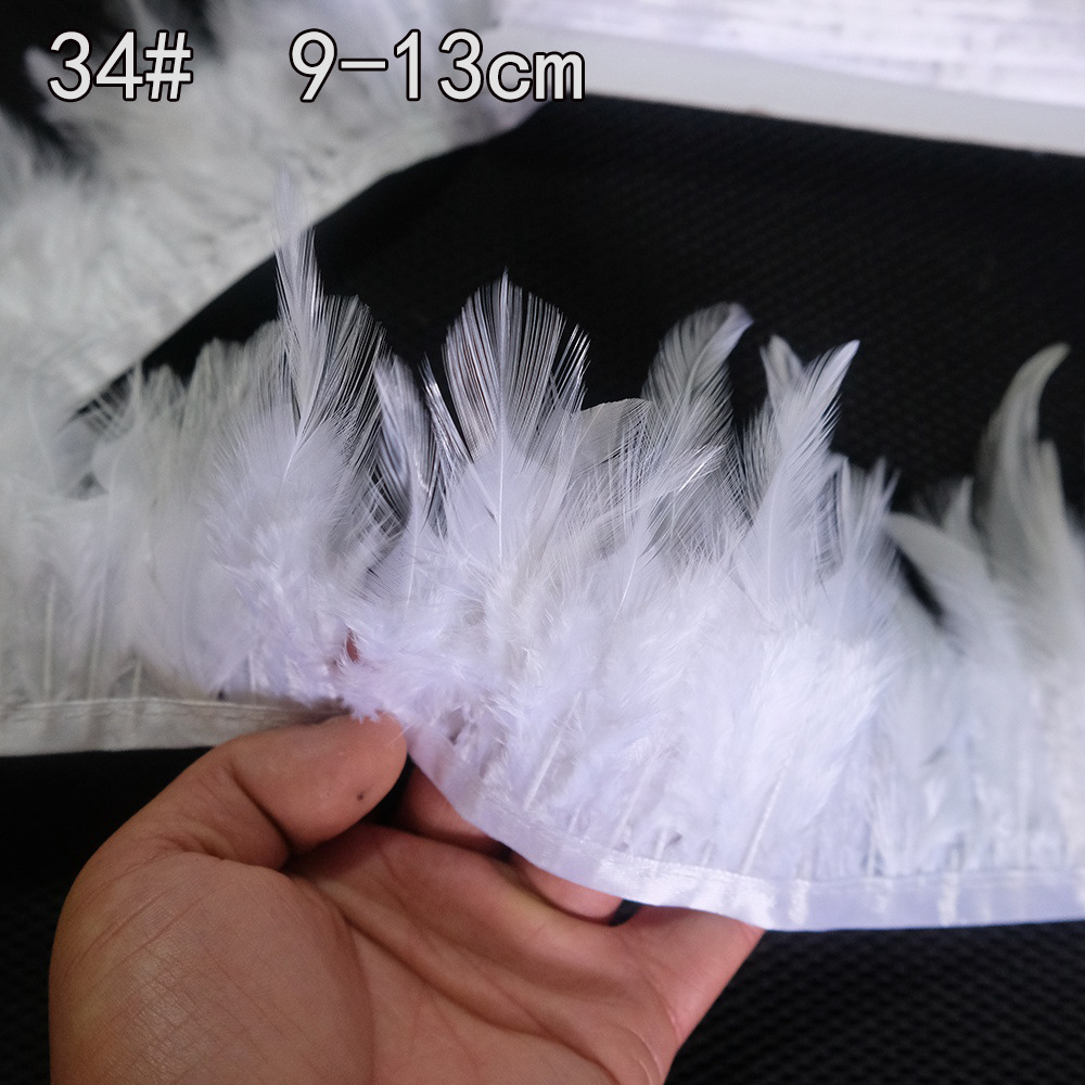 Colección de productos de plumas blancas al por mayor Accesorios de ropa de plumas hechos a mano de bricolaje Accesorios de plumas de ganso Material de plumas de pavo