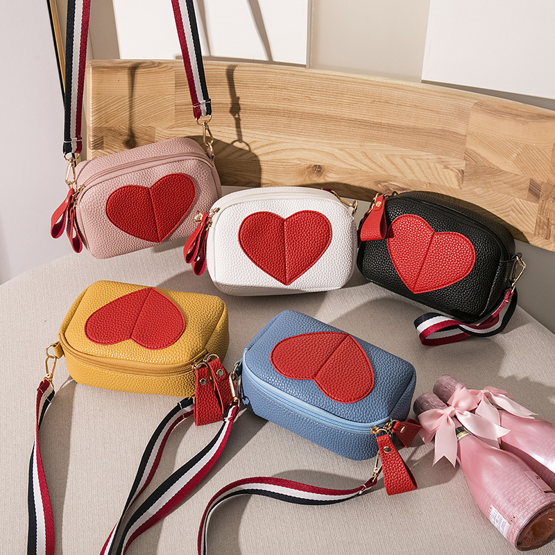 2022 Japón y Corea del Sur nuevos bolsos de mujer bolsos casuales bolsos de hombro bolsos de mochila con cremallera bolsos de teléfono móvil pu bolsos en forma de corazón