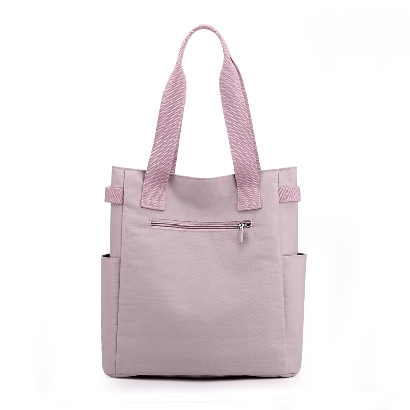 Nuevo bolso de hombro versátil de nailon para mujer, bolso de tela informal a la moda, bolso de lona para mujer, bolso de mano con gran capacidad
