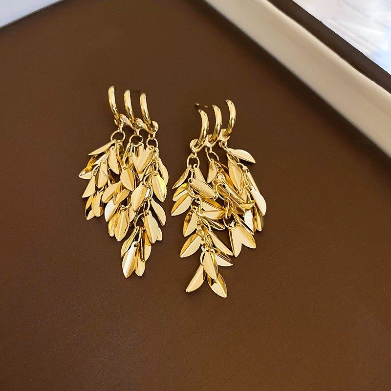 Pendientes de borla de hoja de circón largo de viento de metal con aguja de plata Pendientes de moda exquisita Pendientes de lujo ligero de viento frío