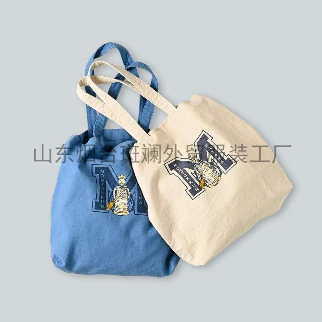 原工厂直供外贸服装45R-OS刺绣卡通帆布包男女同款情侣周边单肩包