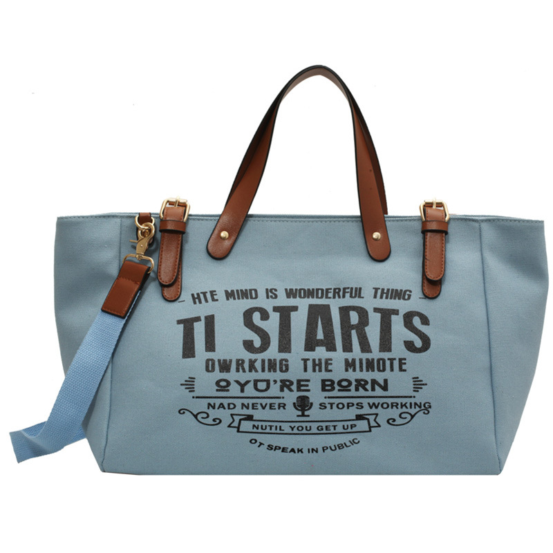 Bolso tote de lona estilo coreano 2025 con letras impresas, bolso de hombro cruzado, bolso tote versátil de gran capacidad.