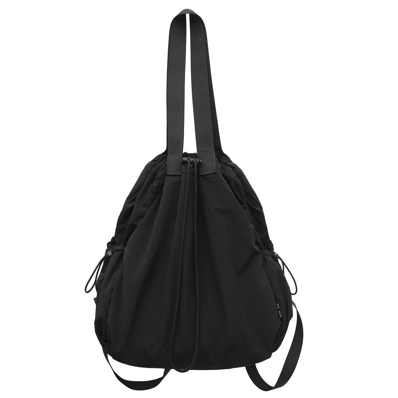 Mochila de nailon con cordón para mujer 2024 nuevo bolso de cubo de doble uso de un solo hombro literario simple para estudiantes universitarios