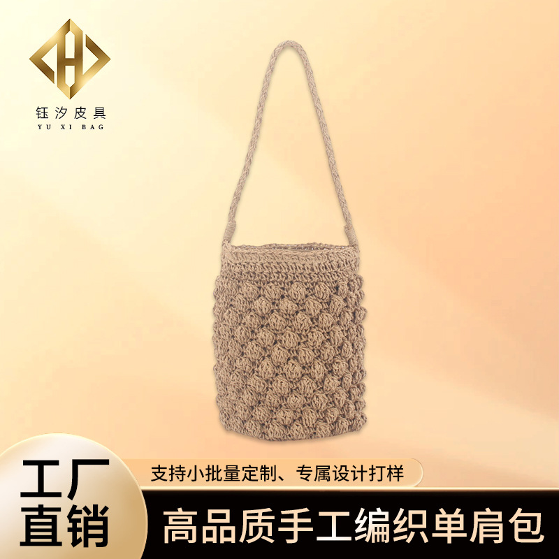 纯手工编织包新款日韩度假草编包水桶包休闲手拎抽带圆筒编织包