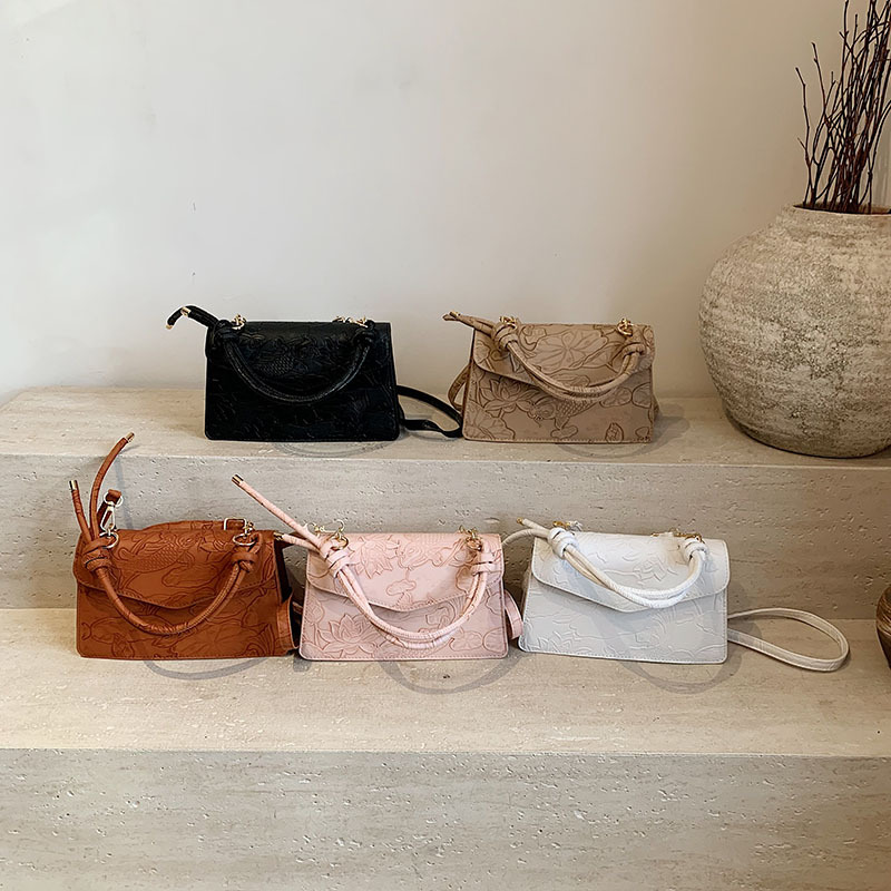 Nuevo estilo de ocio extranjero 2025 primavera de moda simple bolso de hombro flor tridimensional bolso de mochila